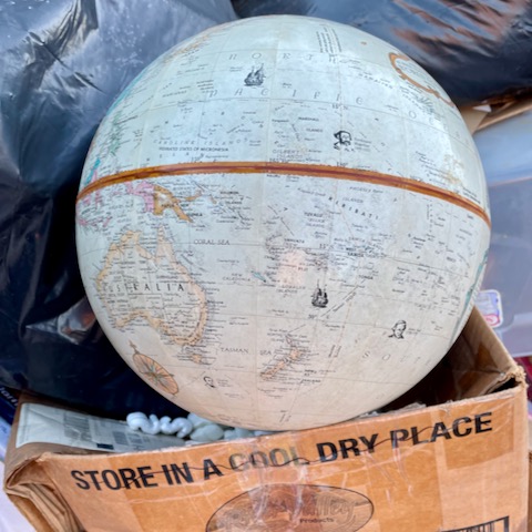 http://zhurnaly.com/images/arty/Store-in-a-Cool-Dry-Place_earth_globe_trash.jpg